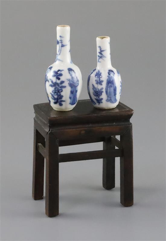 Two similar Chinese blue and white lobed miniature bottle vases, Kangxi period,